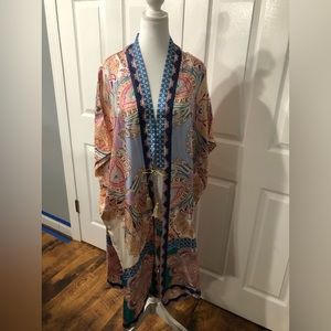 Women’s L/XL 100% silk kimono cover up. New From Chico’s.